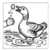 Hand feeding cookie to a goose.